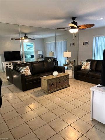 28230 Pine Haven Way, #68, Bonita Springs, FL 34135 Living room featuring light tile patterned floors