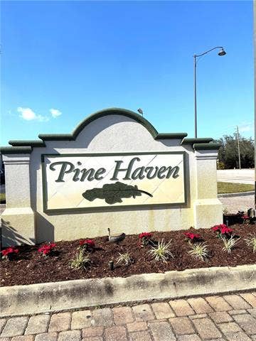 28230 Pine Haven Way, #68, Bonita Springs, FL 34135 View of community / neighborhood sign