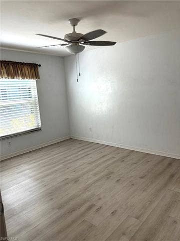 28230 Pine Haven Way, #68, Bonita Springs, FL 34135 Empty room with ceiling fan and light wood-type flooring