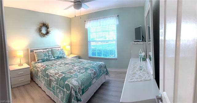 28230 Pine Haven Way, #68, Bonita Springs, FL 34135 Bedroom with ceiling fan and wood-type flooring