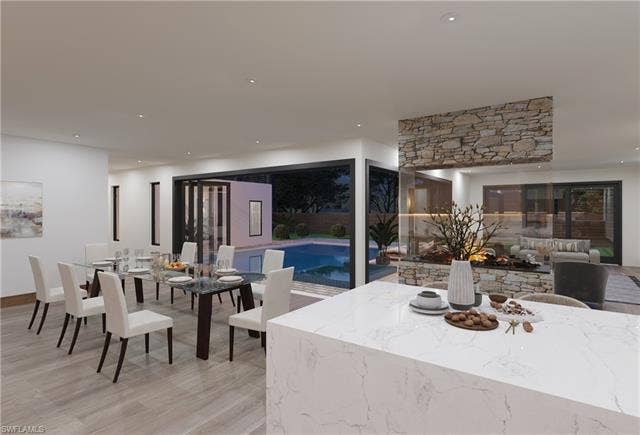 437 Heathwood Dr, Marco Island, FL 34145 Dining area featuring recessed lighting and light wood finished floors