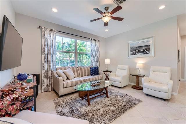 8510 Violeta St, #203, Estero, FL 34135 Living room featuring recessed lighting, light tile patterned flooring, and ceiling fan