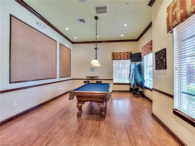 8510 Violeta St, #203, Estero, FL 34135 Game room featuring pool table, ornamental molding, and recessed lighting