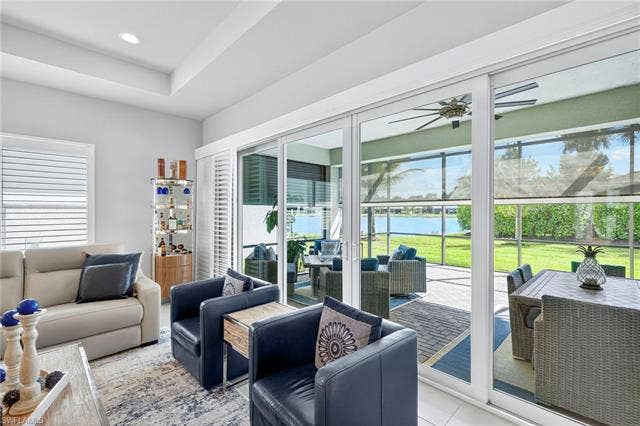 16717 Gilroy St, Bonita Springs, FL 34135 There is a firepit area, a table seating area, open area plus a small table w/ umbrella in far corner! Storm Smart screen partially down to show you can see out it to avoid felling shut in! All furniture will fit, so no need to carry inside!