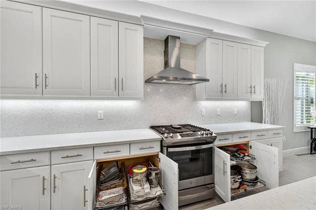 16717 Gilroy St, Bonita Springs, FL 34135 HOW CONVENIENT!!! Roll-out shelves in each lower level cabinet PLUS in the pantry!