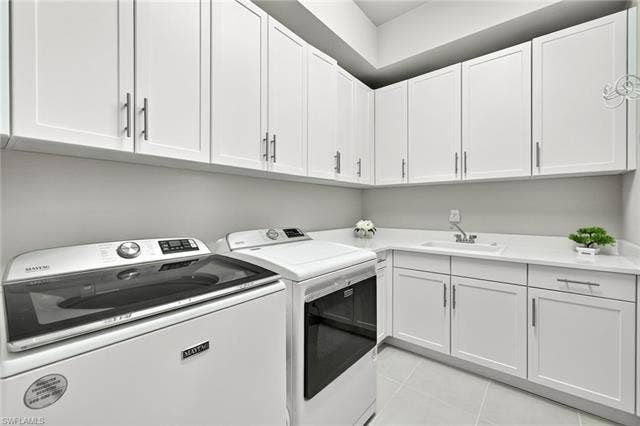 16717 Gilroy St, Bonita Springs, FL 34135 UPGRADED washer and dryer...plus a large utility tub and cabinets galore!!!