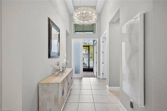 16717 Gilroy St, Bonita Springs, FL 34135 Impressive foyer with tray ceiling and gorgeous chandelier!
