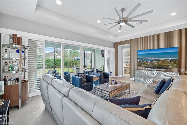 16717 Gilroy St, Bonita Springs, FL 34135 Looking from kitchen towards primary suite. Enough room to complete walk around sectional!