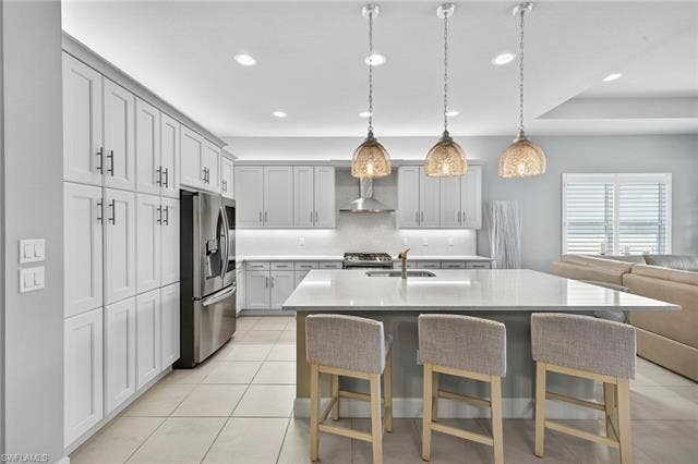 16717 Gilroy St, Bonita Springs, FL 34135 Island seats 5 (1 around the corner towards great room)