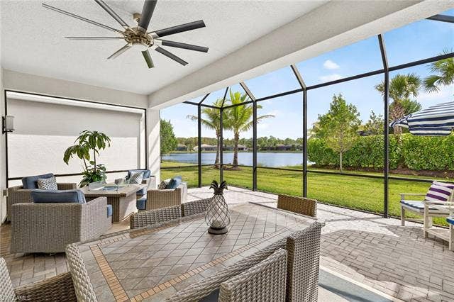16717 Gilroy St, Bonita Springs, FL 34135 The Storm Smart screen to the left is closed. This extended lanai expands your living space tremendously! TV hook-up present. What a serene view!