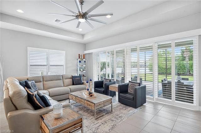 16717 Gilroy St, Bonita Springs, FL 34135 So spacious there's even a sofa table behind the sectional under the side window! Enjoy the water view!!
