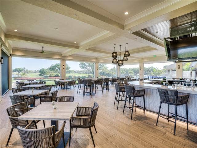 8471 Southbridge Dr, #1, Estero, FL 33967 Covered outside casual dining