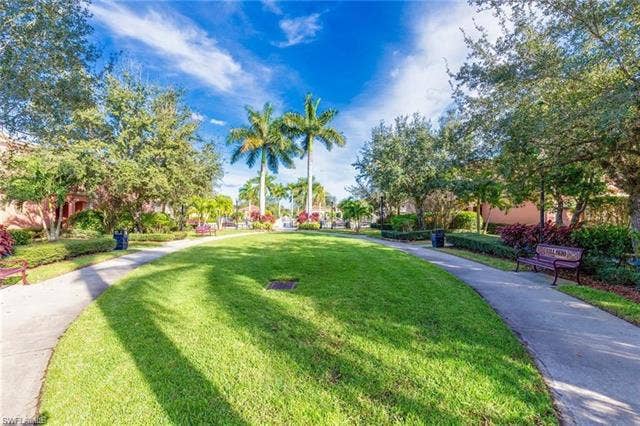 10127 Villagio Palms Way, #203, Estero, FL 33928 View of property's community with a lawn