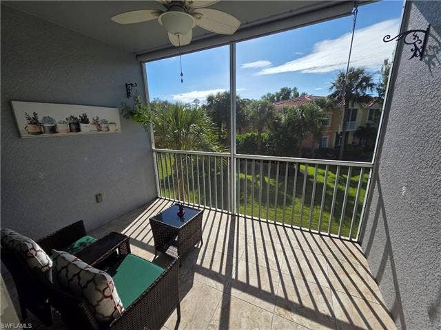10127 Villagio Palms Way, #203, Estero, FL 33928 View of sunroom / solarium