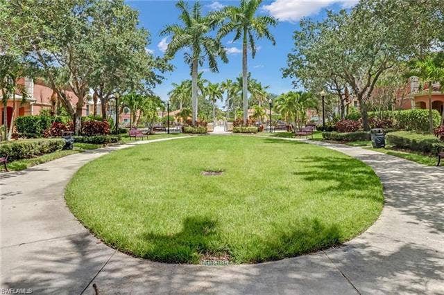 10127 Villagio Palms Way, #203, Estero, FL 33928 View of property's community with a lawn