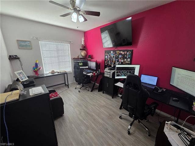 10127 Villagio Palms Way, #203, Estero, FL 33928 Home office featuring light wood-style floors and a ceiling fan