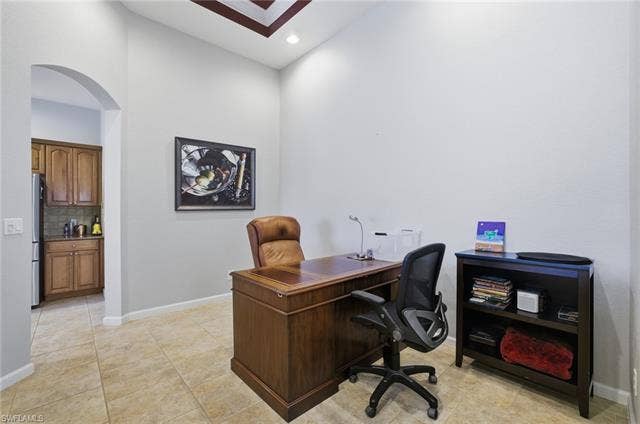 22140 Long Leaf Trail Dr, Estero, FL 34135 Office space with arched walkways, recessed lighting, and light tile patterned floors