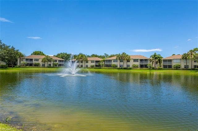 25735 Lake Amelia Way, #103, Bonita Springs, FL 34135 Water view featuring nearby suburban area