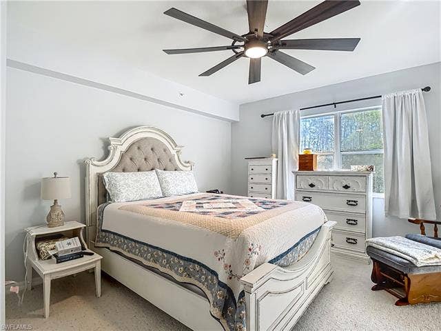 25735 Lake Amelia Way, #103, Bonita Springs, FL 34135 Bedroom featuring ceiling fan