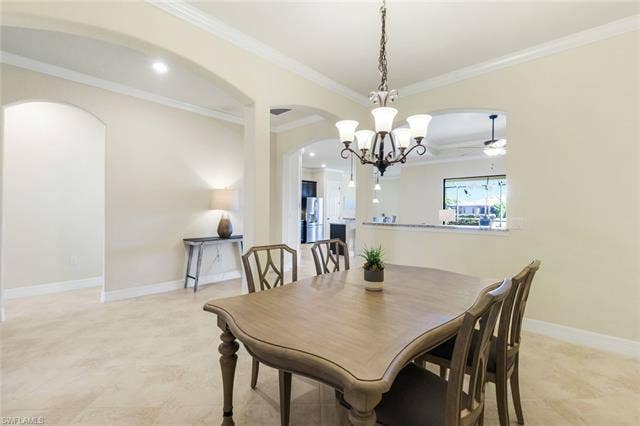 28085 Wicklow Ct, Bonita Springs, FL 34135 Large Separate Dining Area. Entrance to Guest Suite Area.