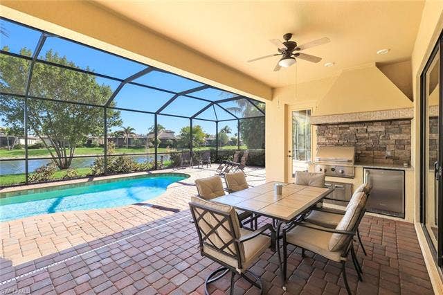 28085 Wicklow Ct, Bonita Springs, FL 34135 Built-in Outdoor Kitchen in Covered Lanai Area.