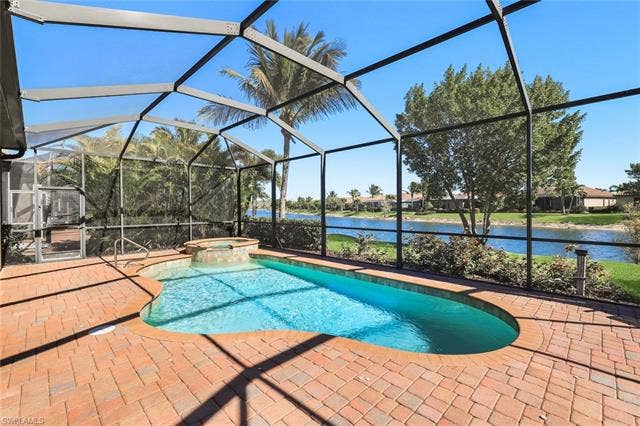 28085 Wicklow Ct, Bonita Springs, FL 34135 Now to the Outdoor Living Area.