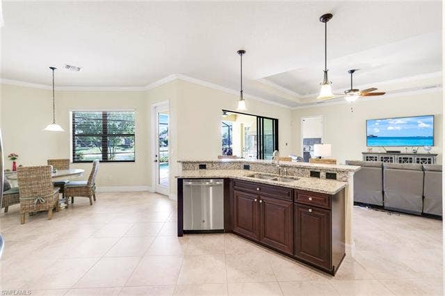 28085 Wicklow Ct, Bonita Springs, FL 34135 Kitchen View Open to Living Area and View of the Outdoors
