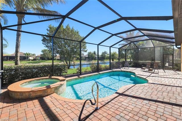 28085 Wicklow Ct, Bonita Springs, FL 34135 Pool with Hot Tub. View of the Lake.