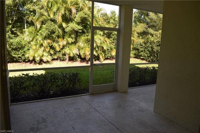 2350 Hidden Lake Ct, #8513, Naples, FL 34112 View of unfurnished sunroom