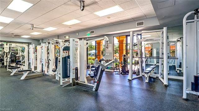 14546 Speranza Way, Bonita Springs, FL 34135 Exercise room with a paneled ceiling