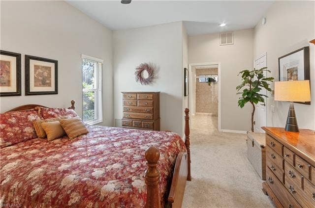 13201 Bridgeford Ave, Bonita Springs, FL 34135 Primary bedroom with entrance to primary bathroom