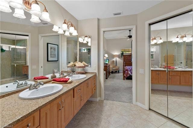 13201 Bridgeford Ave, Bonita Springs, FL 34135 Primary bathroom with large walk in closet
