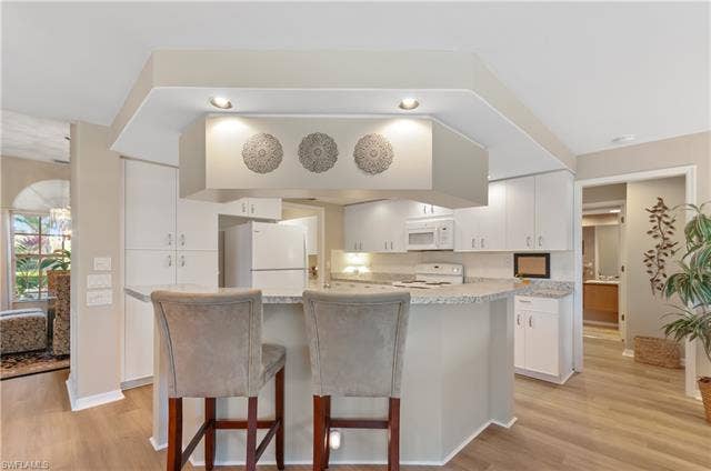 13201 Bridgeford Ave, Bonita Springs, FL 34135 Kitchen has abundance of recessed lighting