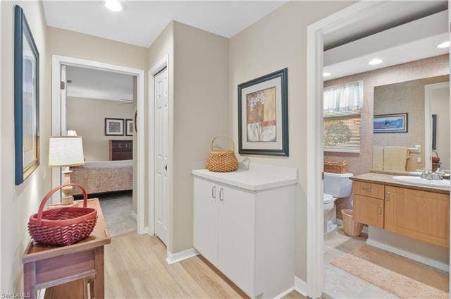 13201 Bridgeford Ave, Bonita Springs, FL 34135 Guest hallway and bathroom