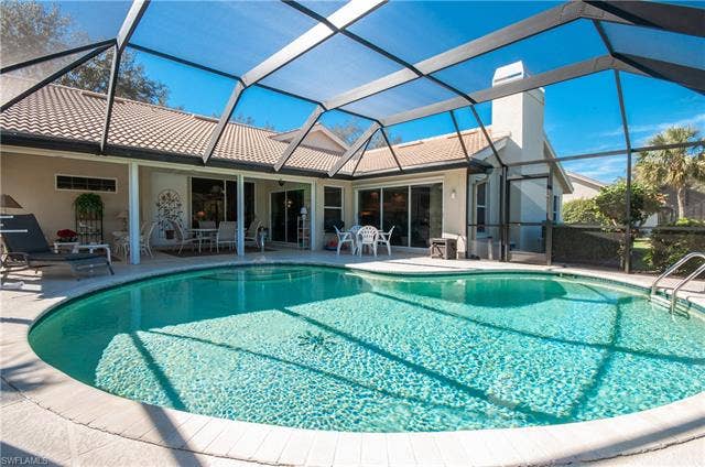13201 Bridgeford Ave, Bonita Springs, FL 34135 Covered lanai with hurricane protection