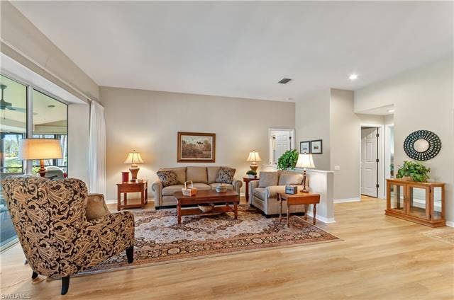 13201 Bridgeford Ave, Bonita Springs, FL 34135 Entrances to Primary bedroom, den and 1/2 bathroom to your right