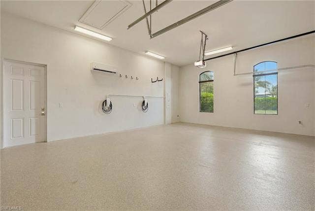 11821 Via Cassina Ct, Miromar Lakes, FL 33913 3 car garage with two Tesla chargers