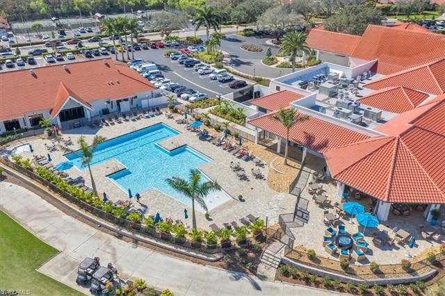 7320 Glenmoor Ln, #2304, Naples, FL 34104 Drone / aerial view of a pool
