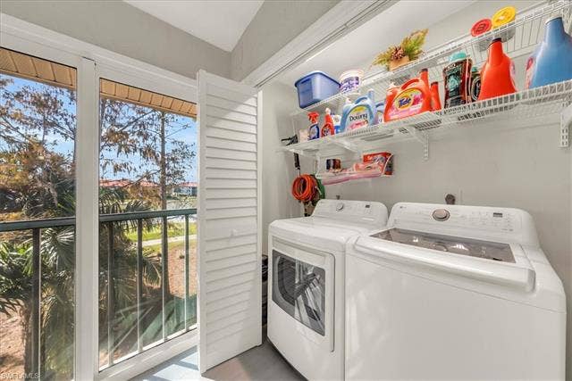 7320 Glenmoor Ln, #2304, Naples, FL 34104 Washroom with washer and clothes dryer