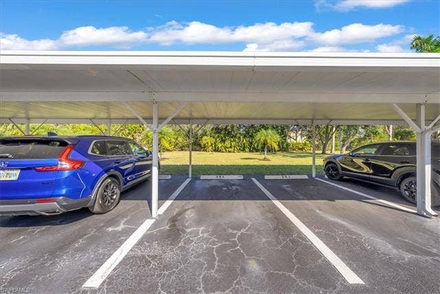 7320 Glenmoor Ln, #2304, Naples, FL 34104 View of covered parking lot