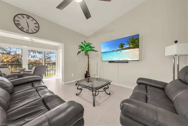 7320 Glenmoor Ln, #2304, Naples, FL 34104 Living area with ceiling fan and high vaulted ceiling