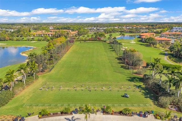 7320 Glenmoor Ln, #2304, Naples, FL 34104 Bird's eye view of a nearby body of water and a golf club