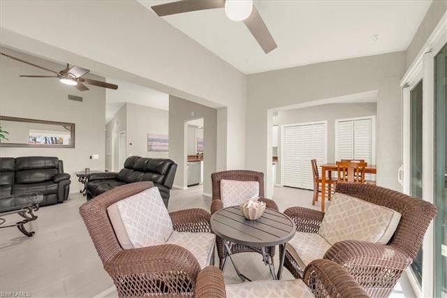 7320 Glenmoor Ln, #2304, Naples, FL 34104 Living room with a ceiling fan