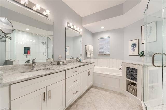 22971 Rosedale Dr, #101, Estero, FL 34135 NEW SHAKER CABINETRY, PLUMBING FIXTURES, LIGHT FIXTURES AND QUARTZ COUNTERTOPS