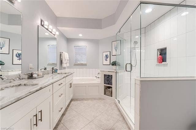 22971 Rosedale Dr, #101, Estero, FL 34135 RE-MODELED BATHROOM OFFERS ADDITIONAL STORAGE SPACE