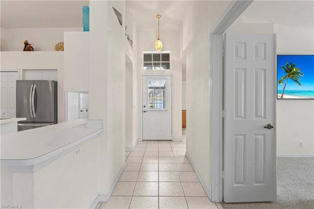 3650 Sunland Ln, Estero, FL 33928 Foyer With Light from the door