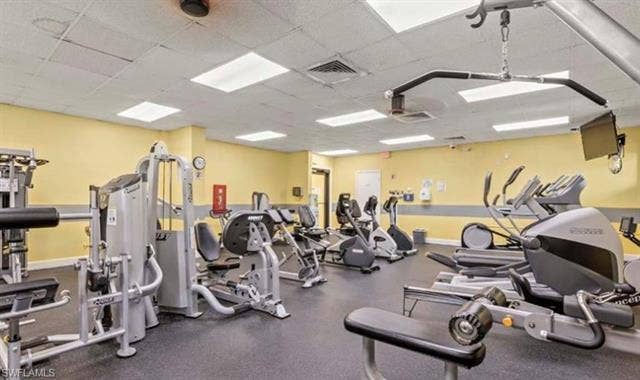 3650 Sunland Ln, Estero, FL 33928 Workout area with a drop ceiling