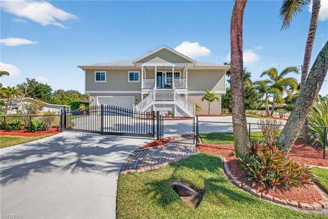 27310 Patrick St, Bonita Springs, FL 34135 Front has remote operated gates