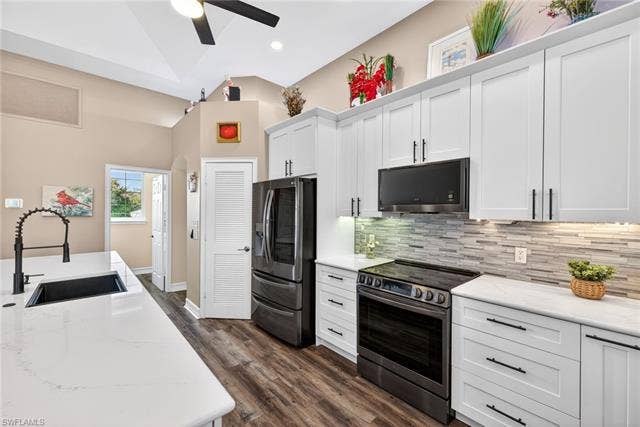 27310 Patrick St, Bonita Springs, FL 34135 Cabinets and drawers are slow close. There is also a built in spice rack