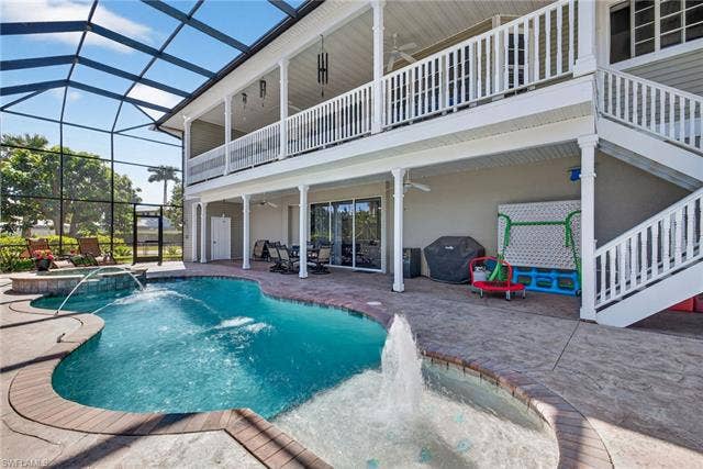27310 Patrick St, Bonita Springs, FL 34135 Door in backgound is pool bath